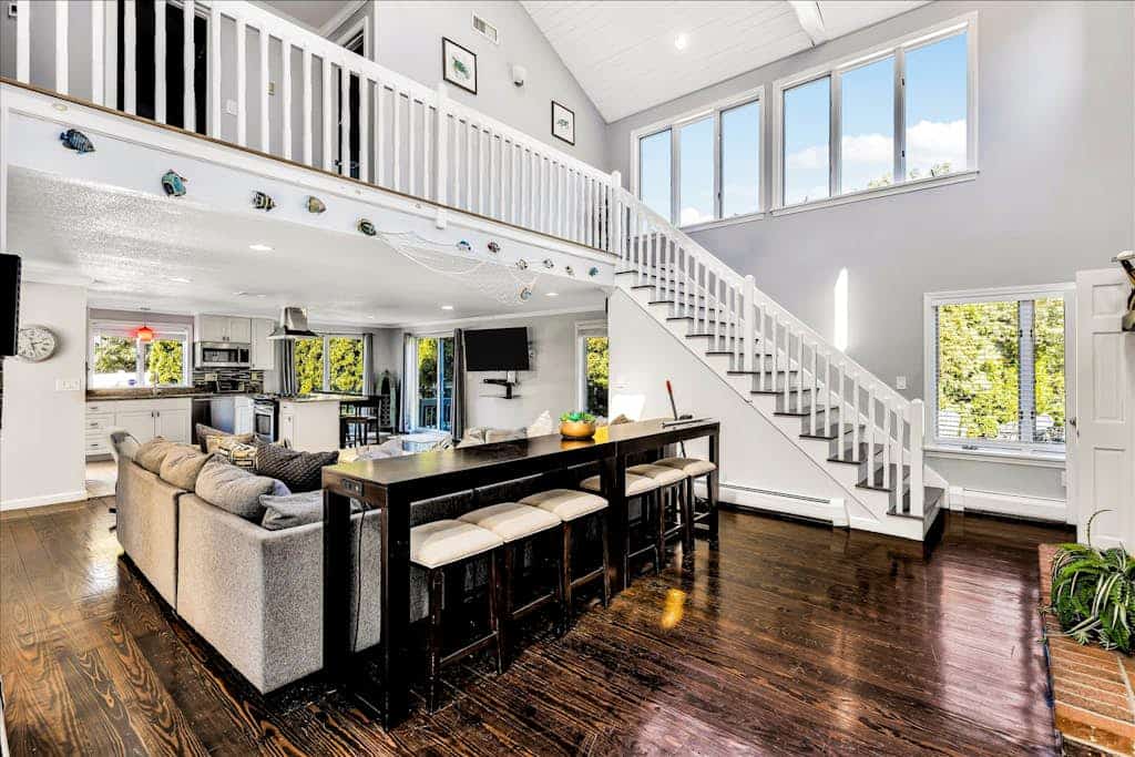 Spacious coastal retreat with heated pool, kayaks, game room & pond views