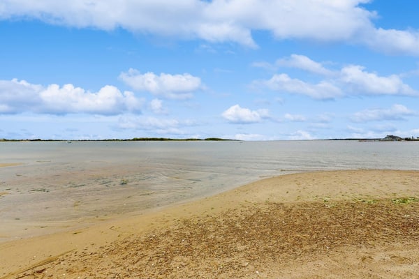 Peaceful waterfront home with private beach, marsh views, AC & spacious interior