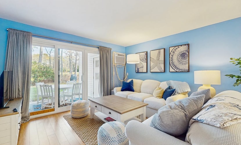 Modern fairway condo with open layout, private patio, AC & washer/dryer