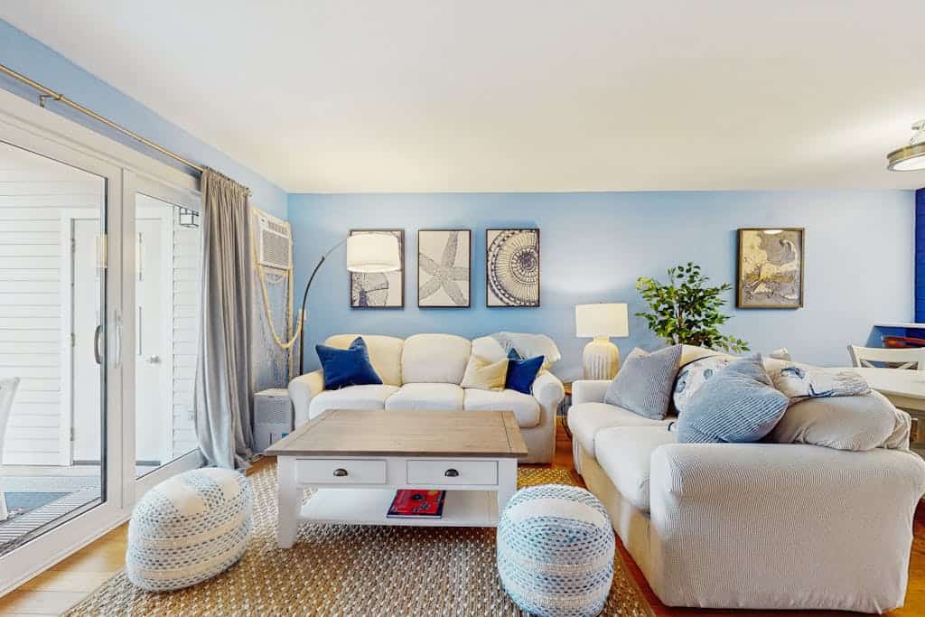 Modern fairway condo with open layout, private patio, AC & washer/dryer