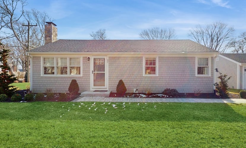 Peaceful Maravista escape with AC, W/D, yard, walk to Great Pond, & breezy charm