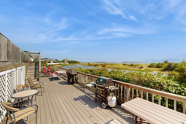 Quintessential coastal studio with beach access, BBQ area, patio, & water views