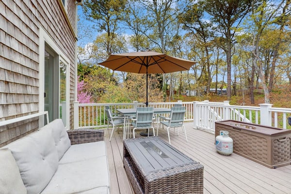Cheery house with deck, sunroom & patio - short walk to pond, beach & Rail Trail