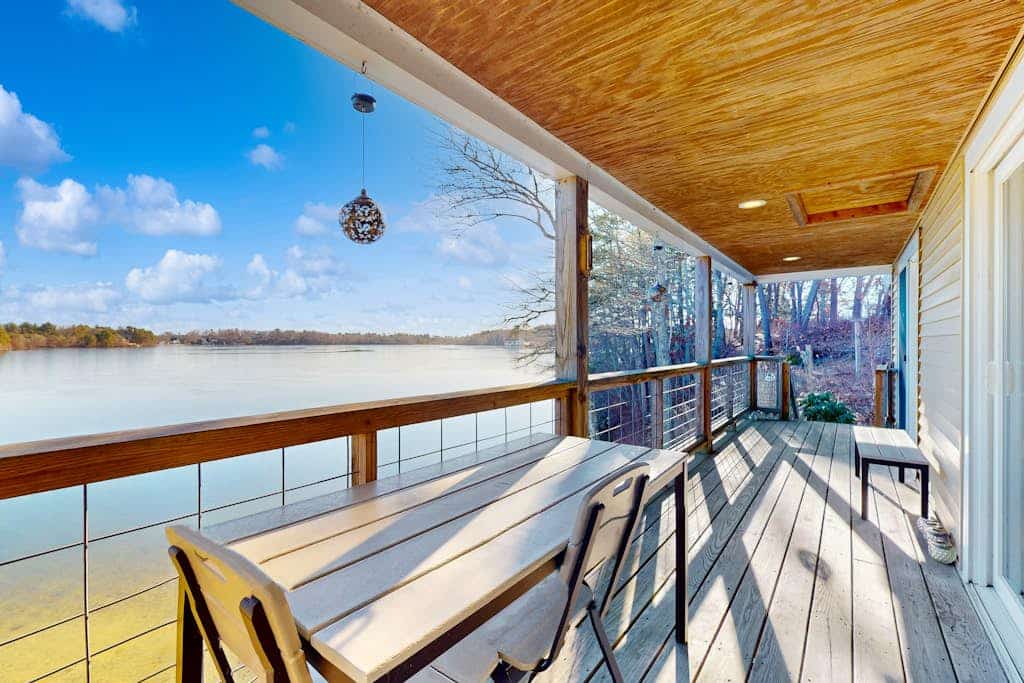 Stunning lakefront home with kayaks, games, & amazing deck views - dog-friendly