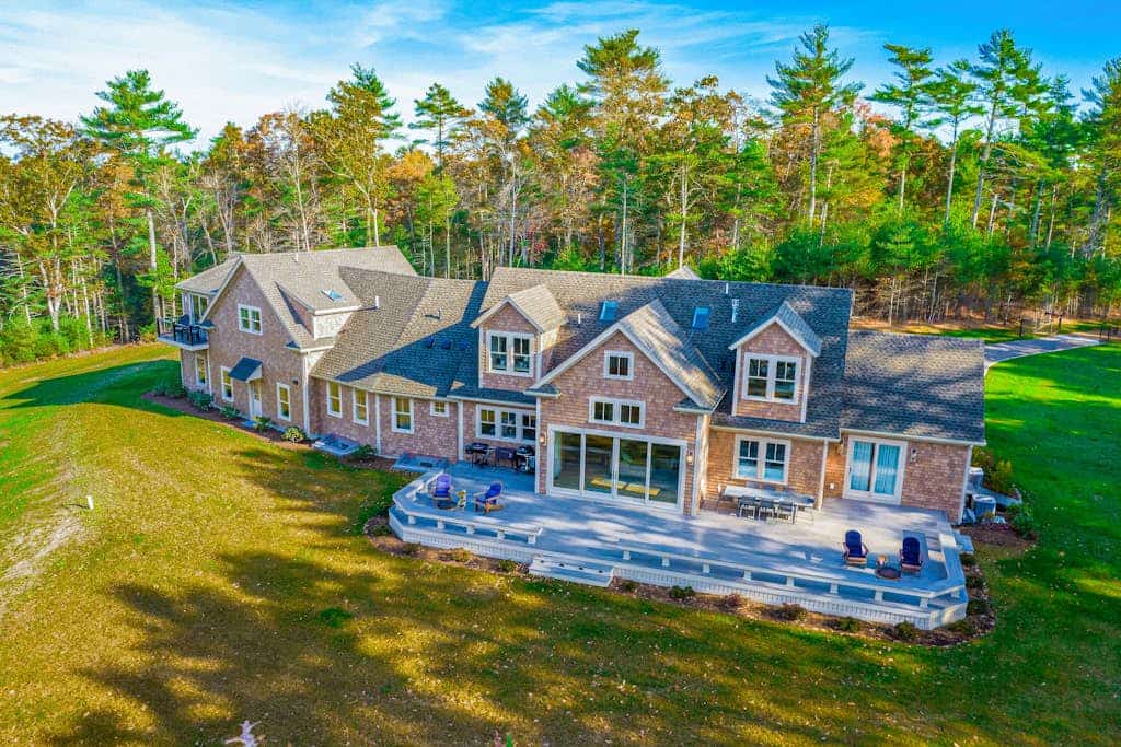 Incredible home on lake with views, private beach, deck, AC, & W/D