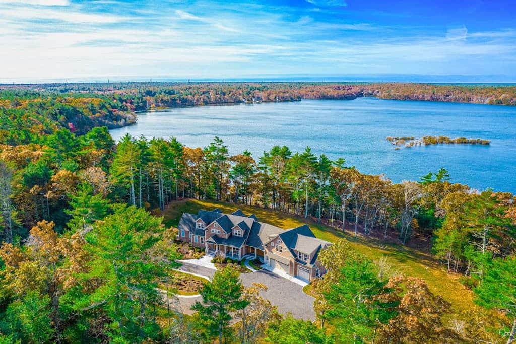 Incredible home on lake with views, private beach, deck, AC, & W/D