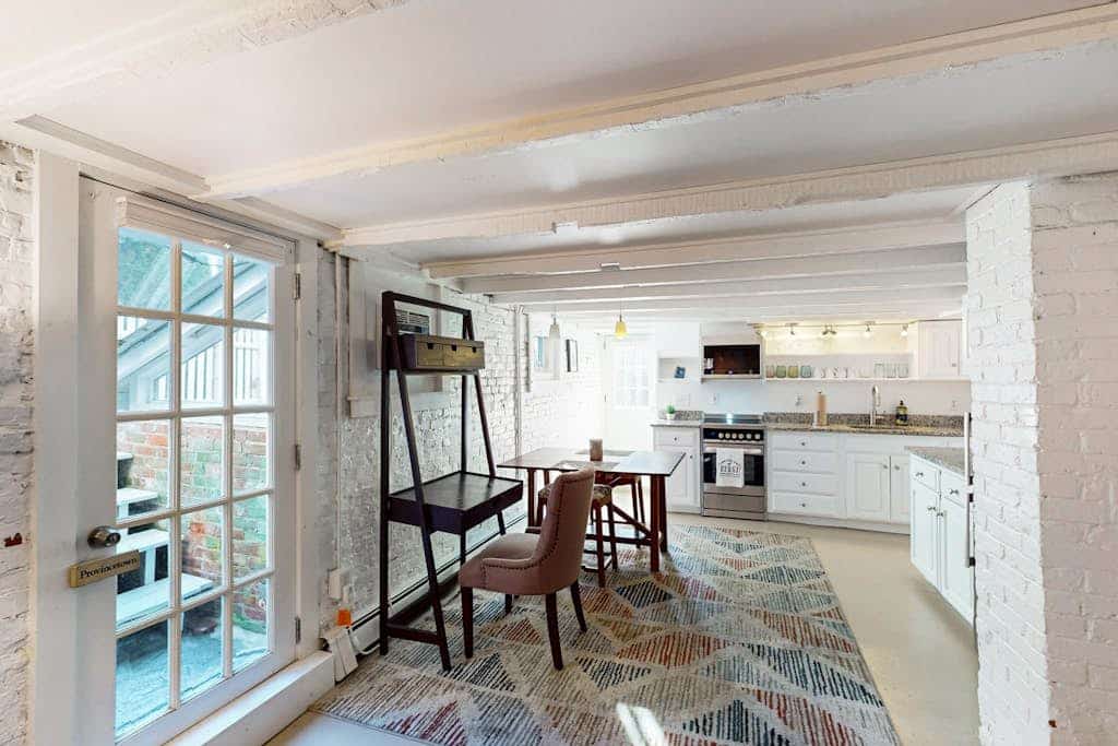 Modern & bright condo with patio, W/D, and central location near town & beach