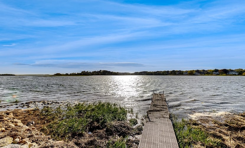 Waterfront house on Bucks Creek Marsh with deck, dock, & kayaks