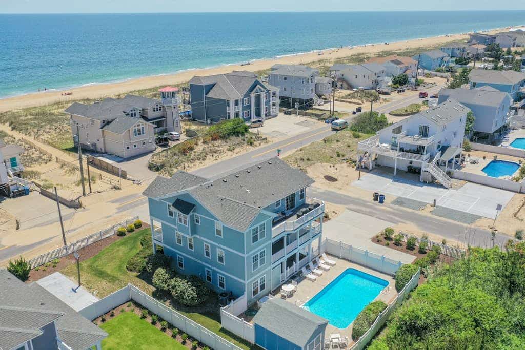 Spacious home across from the beach with partial ocean views, pool, & pool table