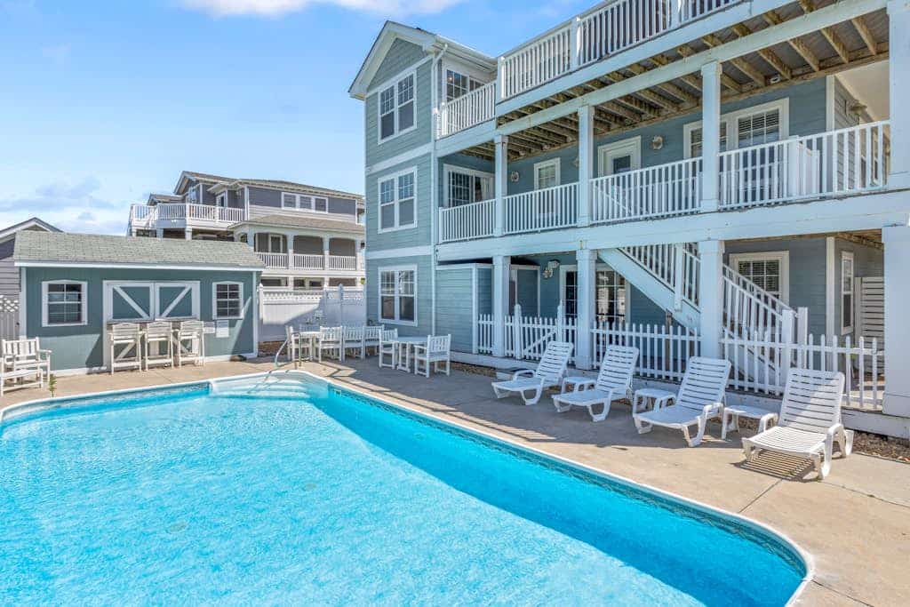 Spacious home across from the beach with partial ocean views, pool, & pool table