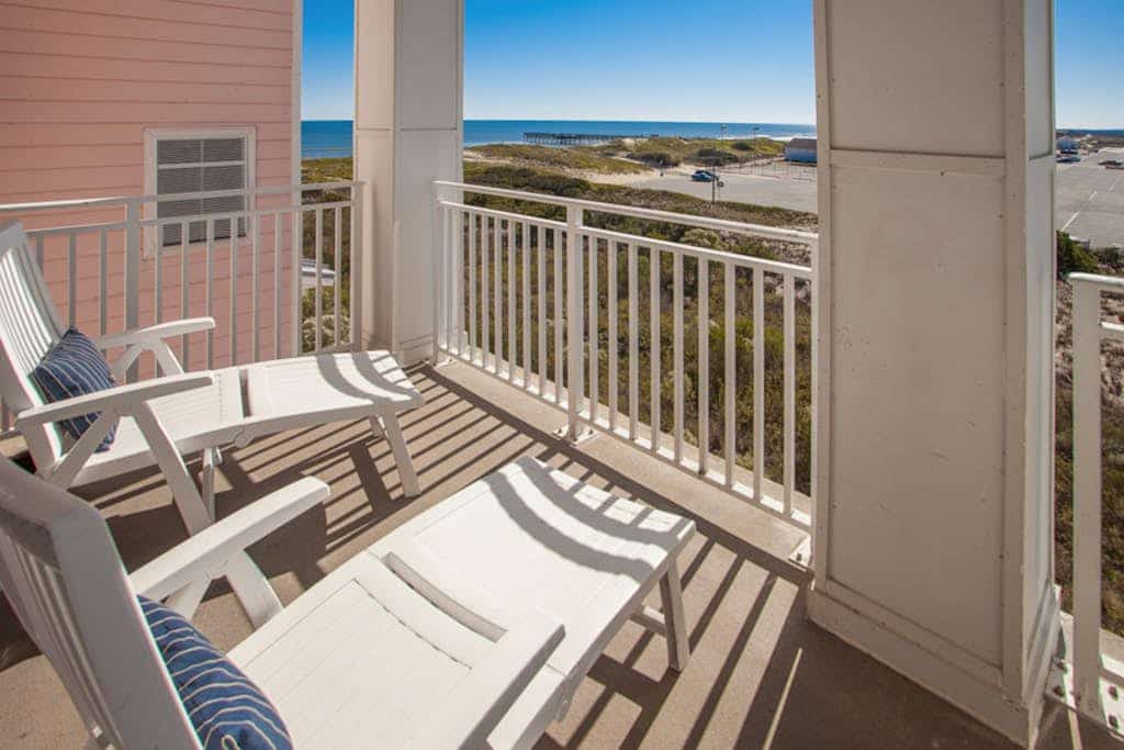 Vacation escape with beach and bay views, pools, & balconies