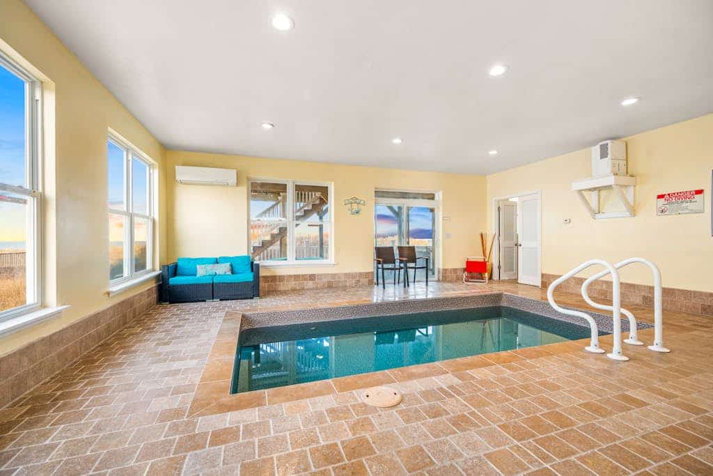 Spacious beach house with indoor pool, hot tub, & multiple decks