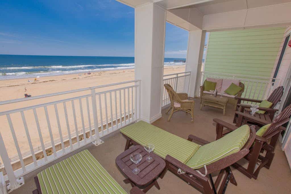 Oceanfront condo with large wraparound deck, expansive views, pools & gym
