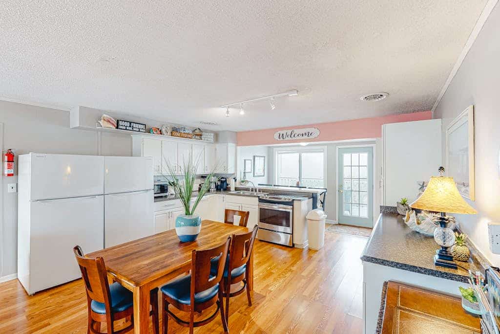 Beach house close to the pier w/private outdoor pool, gas grill, dock, decks, AC