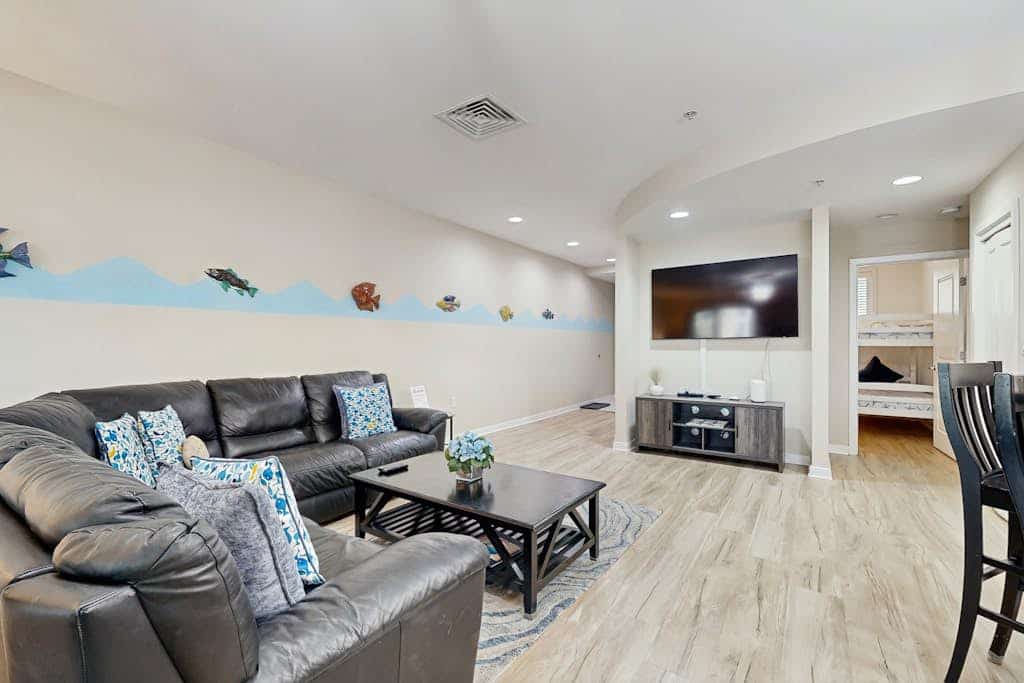 Renovated condo with ocean and back bay views, central AC, & pools