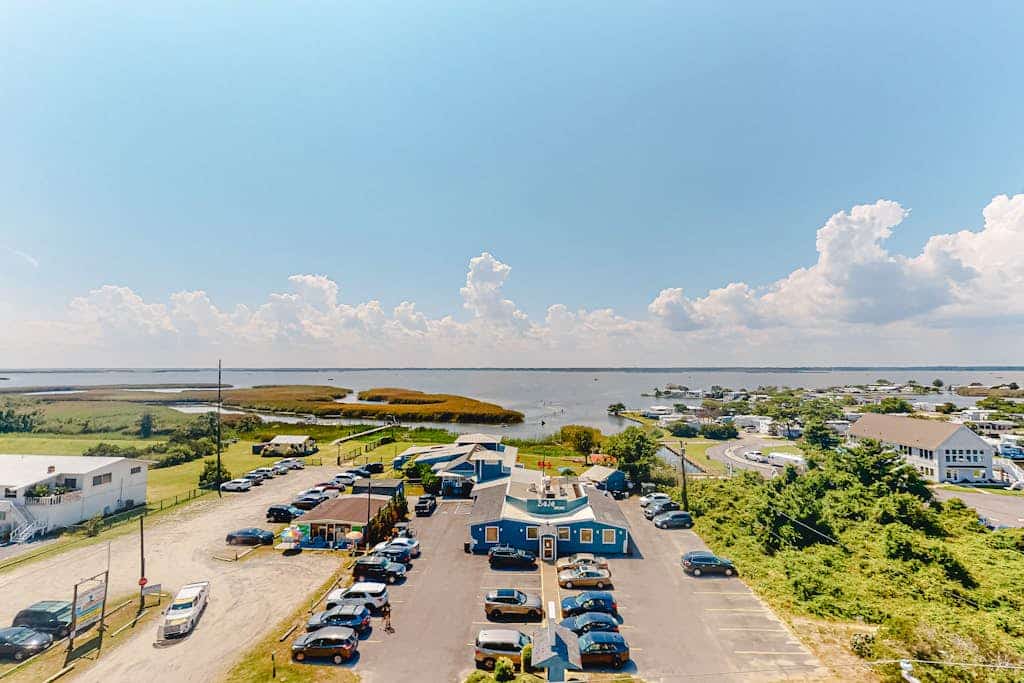 Two-story penthouse with huge bay views & pools - steps to beach