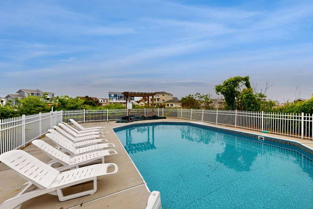 Incredible bayfront home with private dock, pool & 2 fireplaces