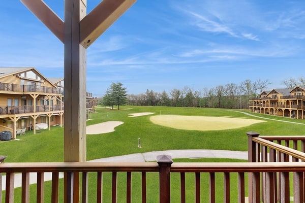 Lovely home overlooking golf course with WiFi, AC, pool, hot tub - near lake