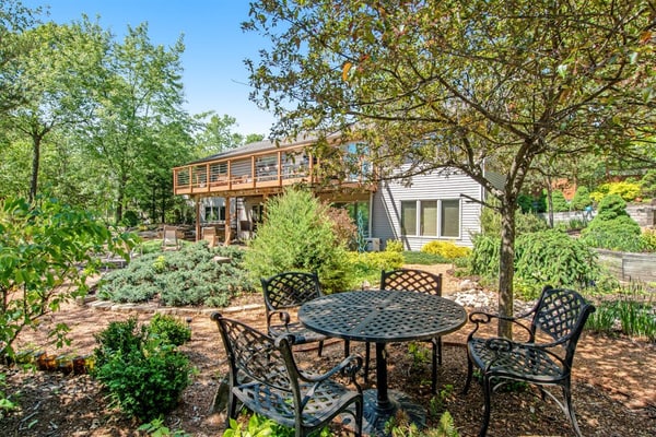 Green side smart home with golf, beach/lake access, off-site dock & EV charger
