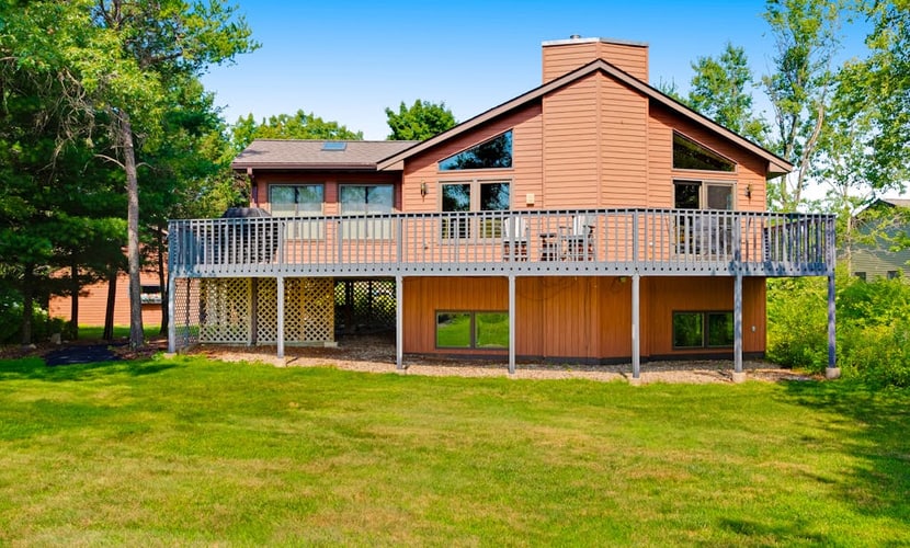 Golf course-front home with 2 pools, private beach, boat launches, tennis, grill