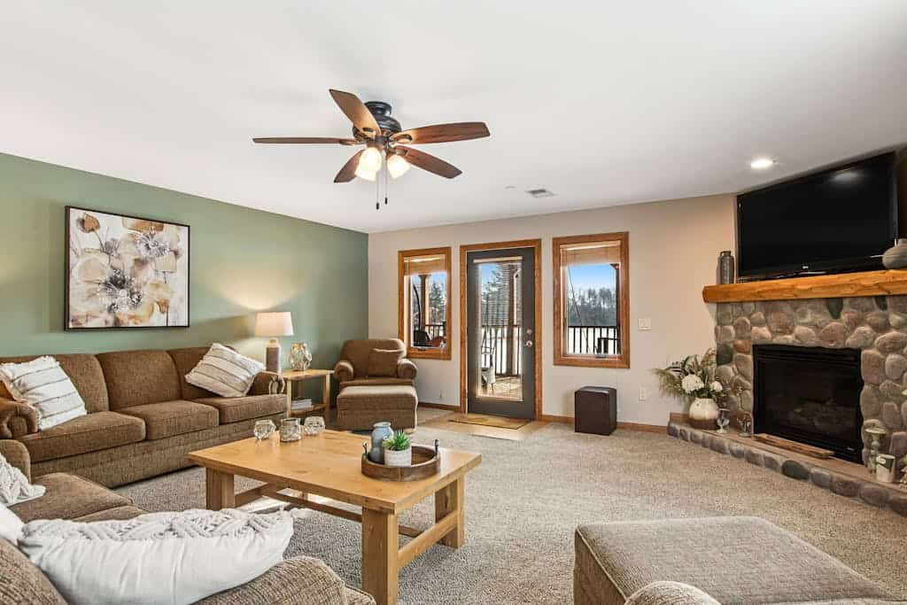 Condo at waterfront resort with golf course views, central AC, W/D, & pool