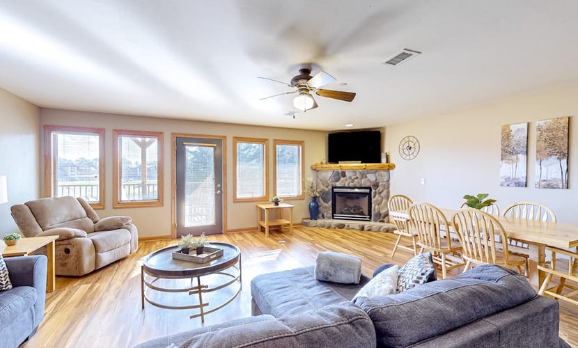 Golf course-front condo with pool, hot tub, dock, tennis, golf, & private beach
