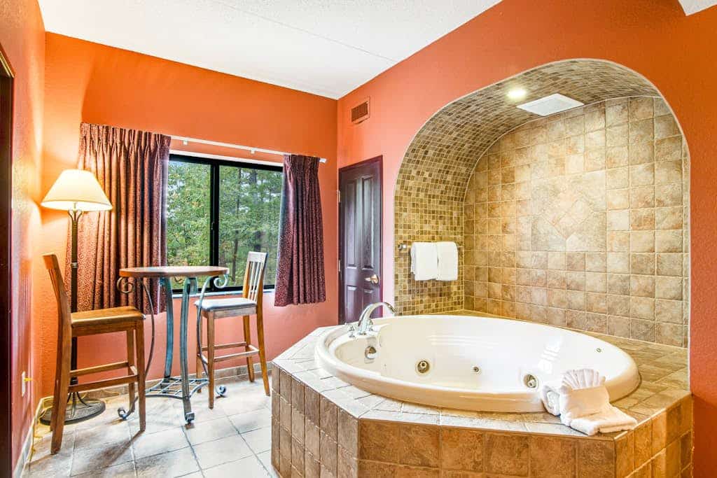 Roomy condo in quiet locale with jetted tub, fireplaces & AC