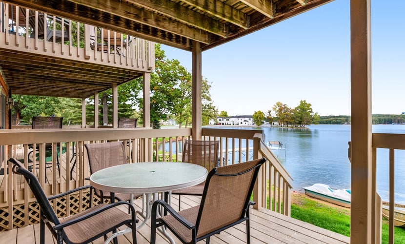 Inviting lakefront retreat - amazing views, beach access, dock & inviting deck