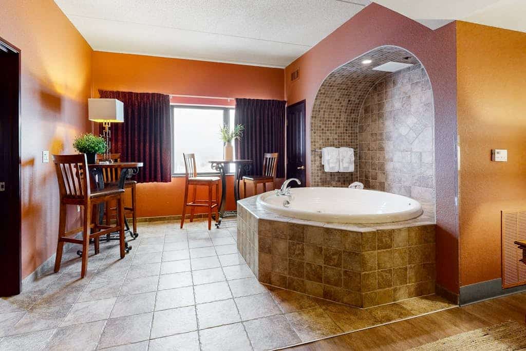 Studio/two-bedroom combo with fireplace, balcony, & jetted tub