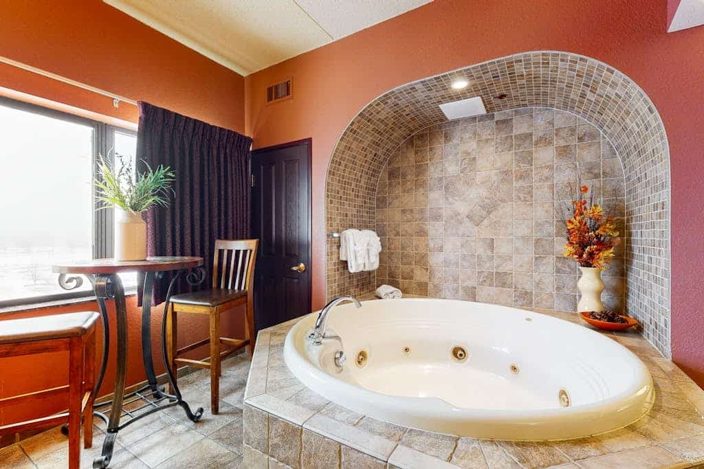 Studio/two-bedroom combo with fireplace, balcony, & jetted tub