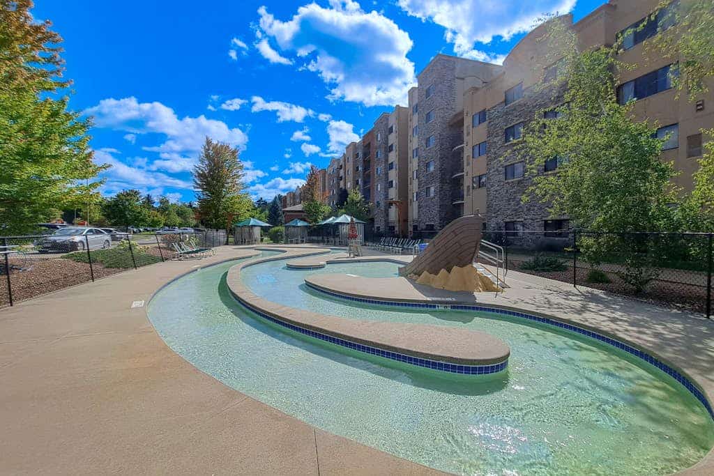 Inviting ground-floor condo with fireplace, patios, AC, & jetted tub