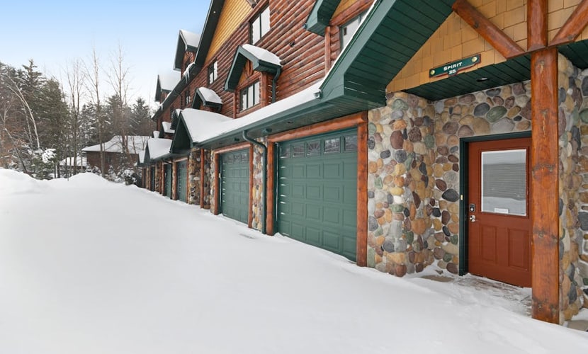 Waterfront townhome with fireplace, private patio, & shared boat docks