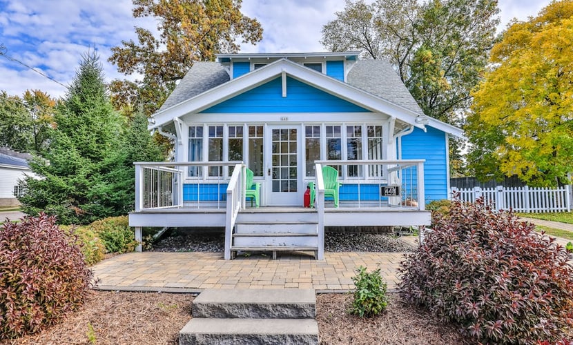 Charming lakefront home with shared dock, porch, & sunroom - walk downtown