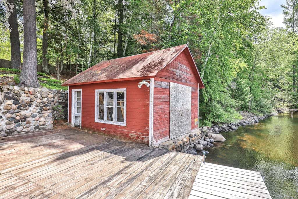 History-filled lakefront home with dock, fire pit, fireplace, & kayaks - dogs OK