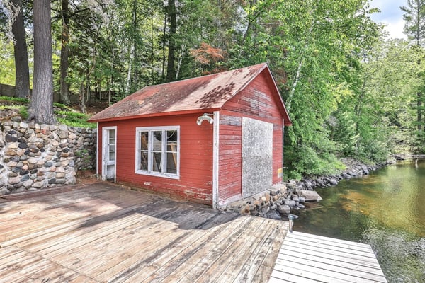 History-filled lakefront home with dock, fire pit, fireplace, & kayaks - dogs OK