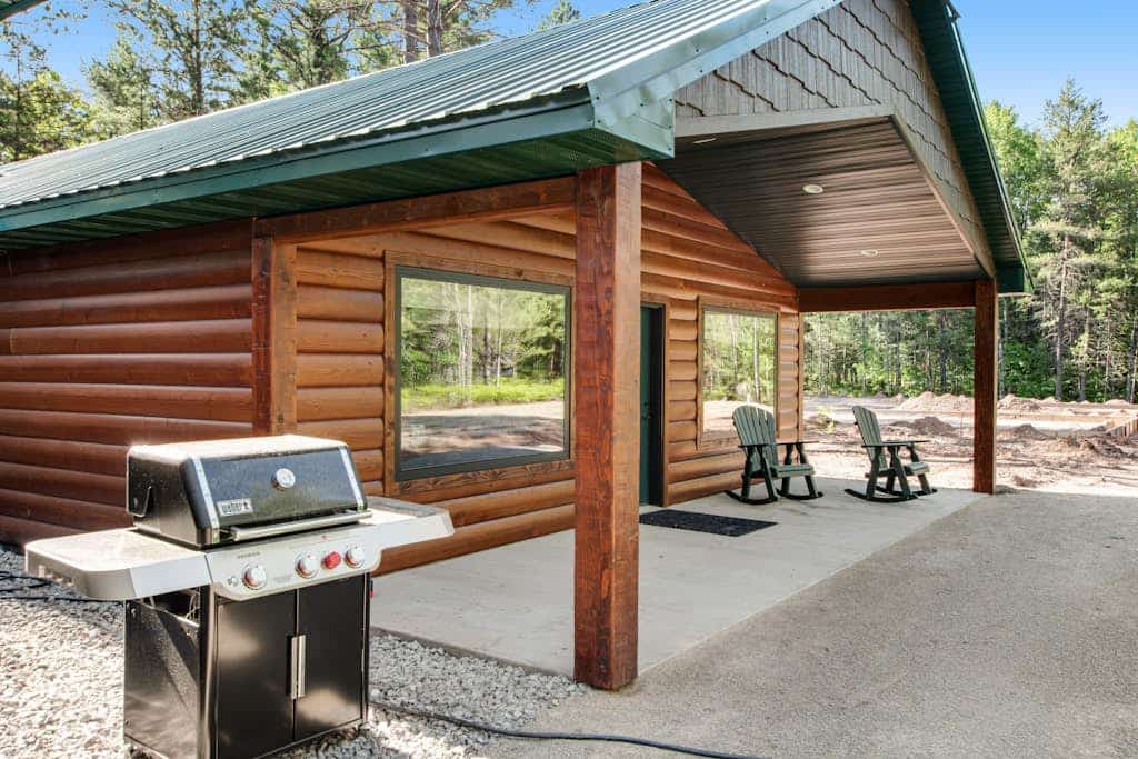 Inviting dog-friendly cabin with hot tub, fireplace, patio, grill, central AC, & W/D