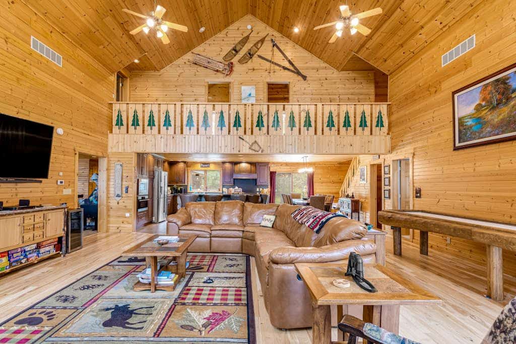 Lakefront home with game rooms, dock, kayaks, private beach, fireplace, firepit