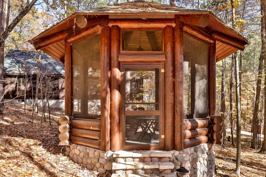 Dog-friendly, lakefront lodge in the woods with large dock, central AC, & canoe
