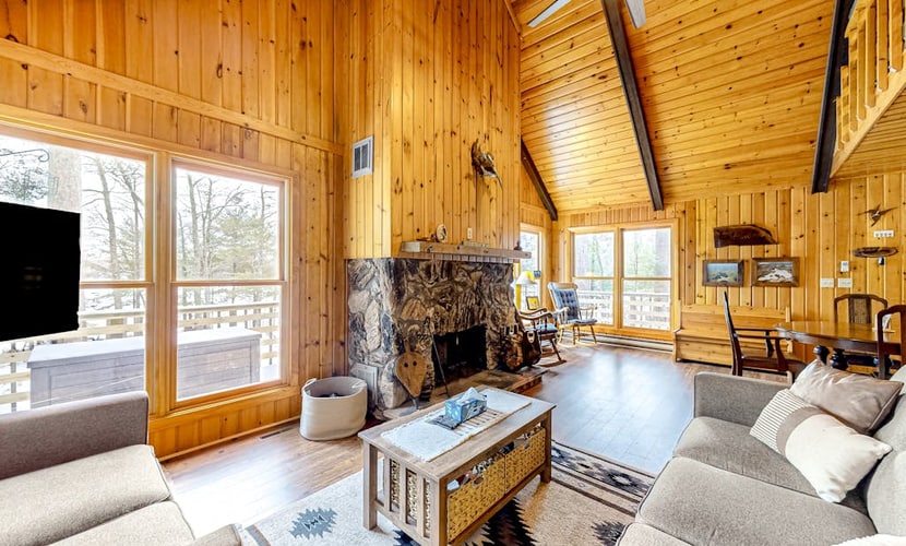 Lakefront dog-friendly retreat with sauna, dock, canoe, paddle board, & firepit