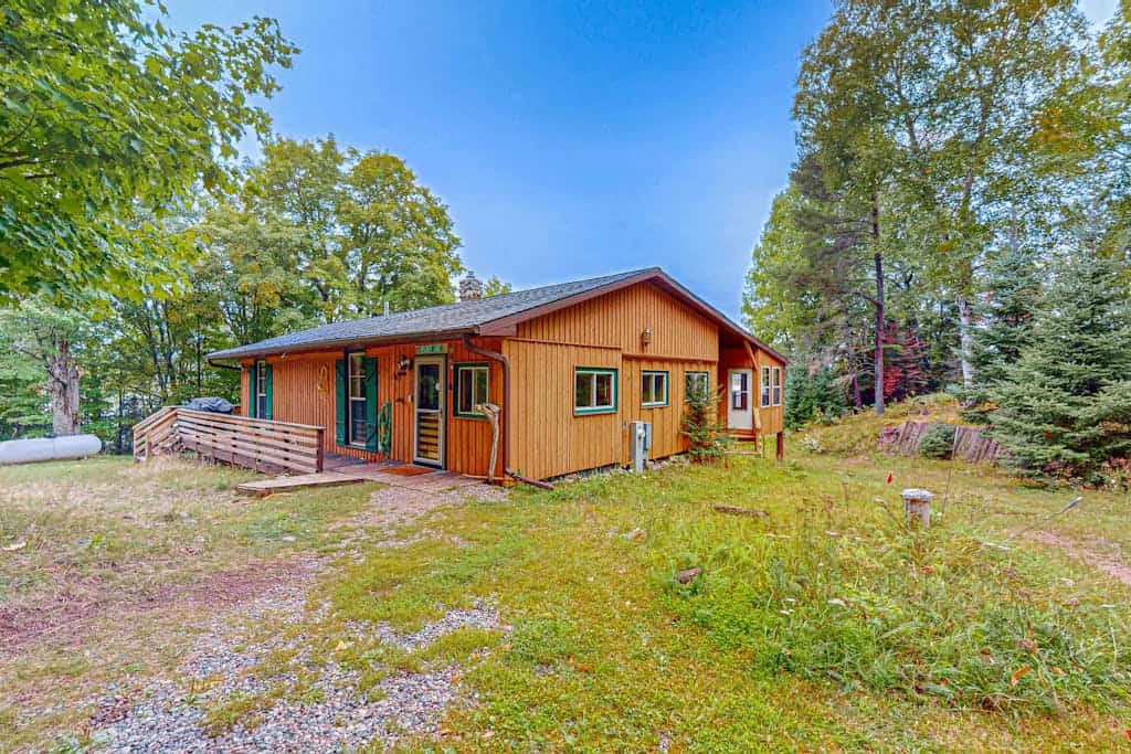 Dog-friendly lakefront home with boat access, deck, fireplace, gas grill, kayaks