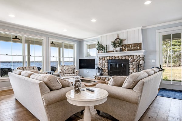 Dog-friendly, lakefront house with beach access, dock, AC, W/D, patio, & firepit