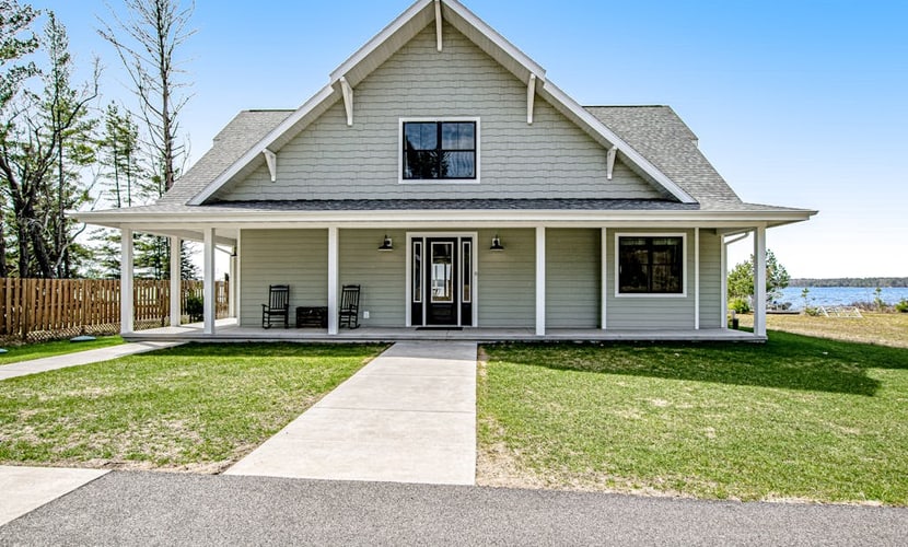 Two dog-friendly lakefront homes with docks, kayaks, rowboat, firepits & beach