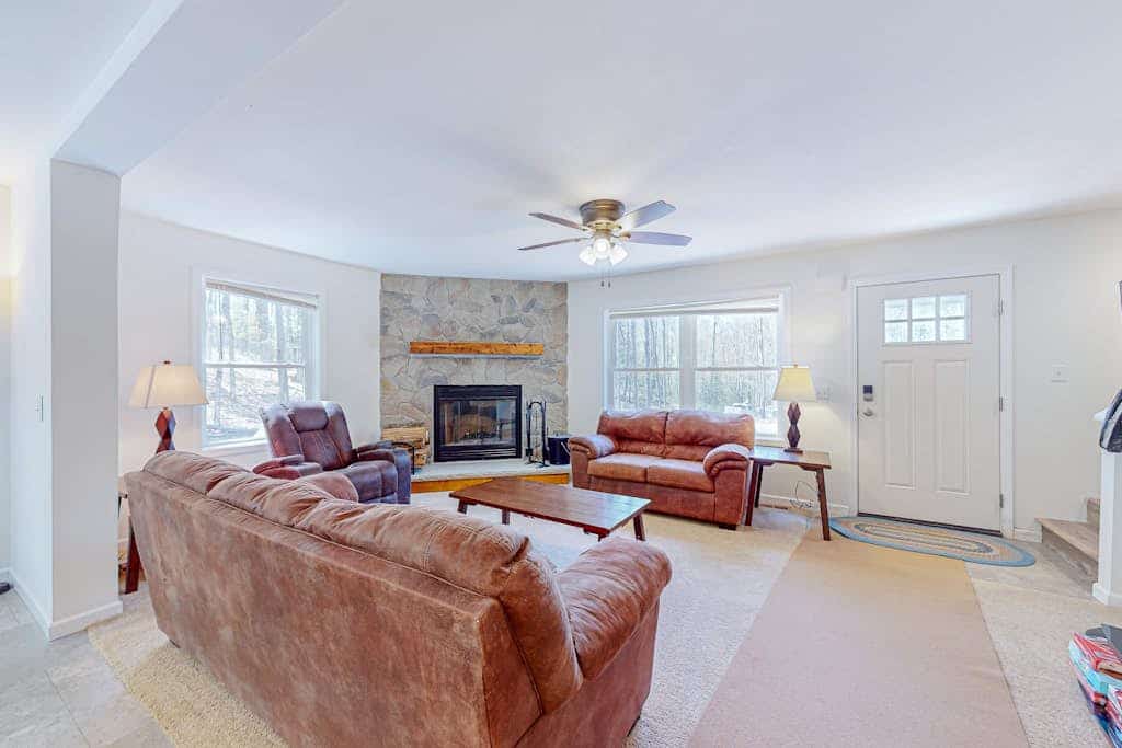 Secluded retreat w/ lake access, snowmobile/ATV trail, large garage & bunk room