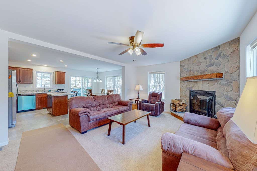 Secluded retreat w/ lake access, snowmobile/ATV trail, large garage & bunk room