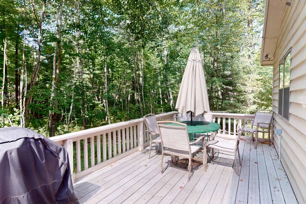 Cozy wooded home w/ access to snowmobile trail, near town, lakes, & bike trails