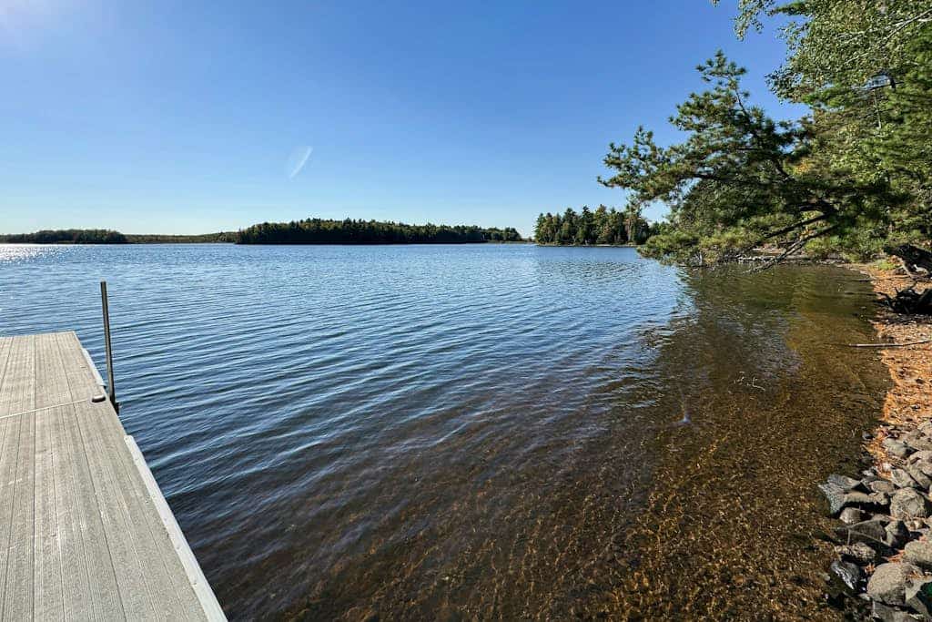Waterfront home in great location with private dock, firepit &  deck