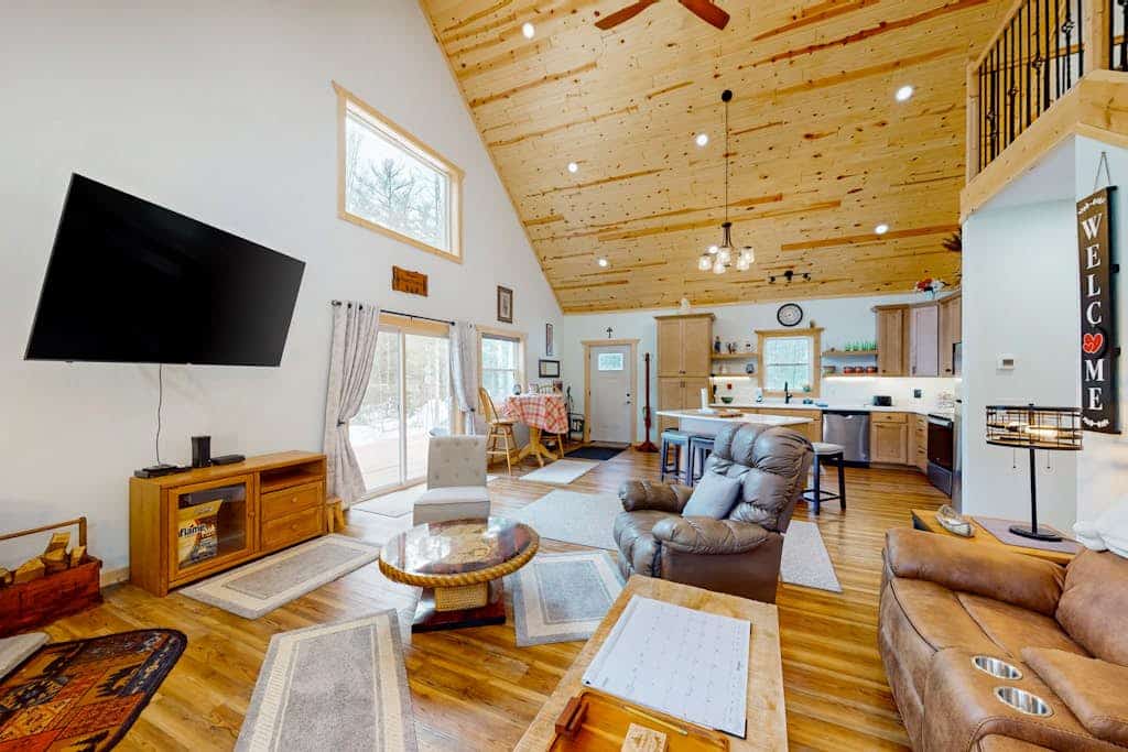 Lakefront home with, dock, kayaks, paddle boards, fire pit & more