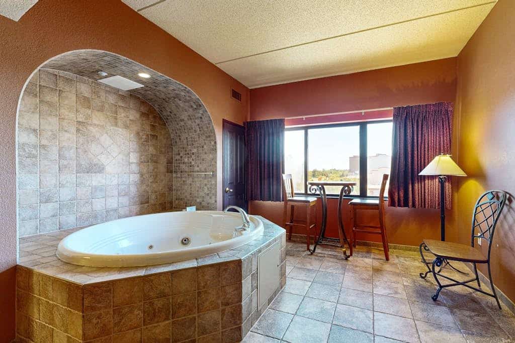 Side-by-side condos with in-room Jacuzzi, two fireplaces, & full kitchen