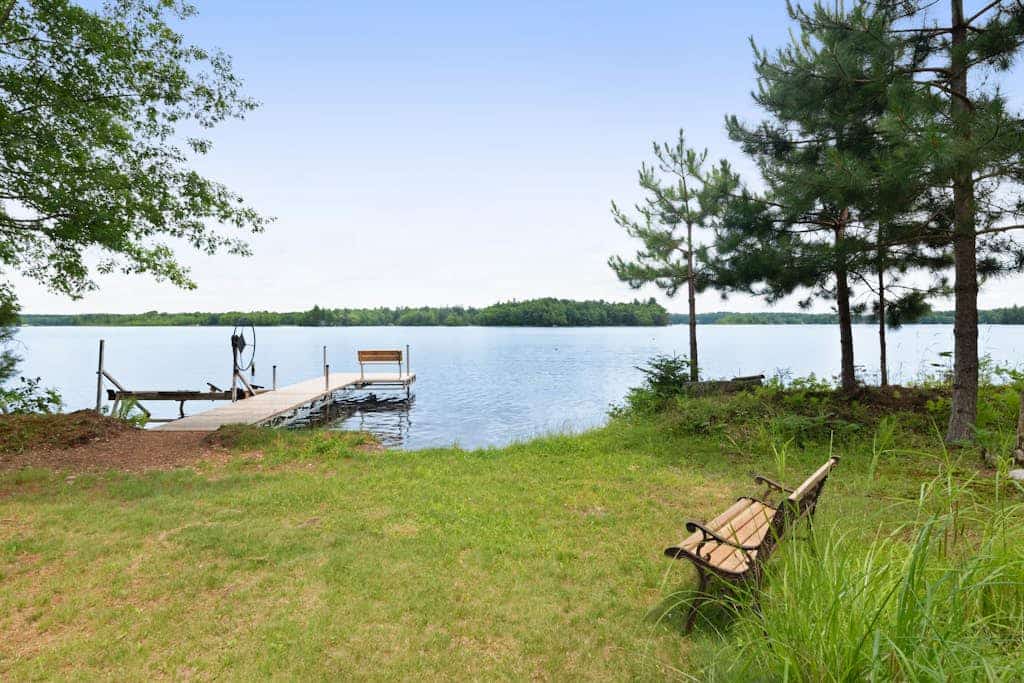 Large, waterfront home w/ a full kitchen, dock, canoes, & outdoor firepit
