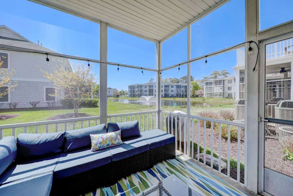 The Tides condo with enclosed porch, balcony, fireplace, bikes, pool & hot tub